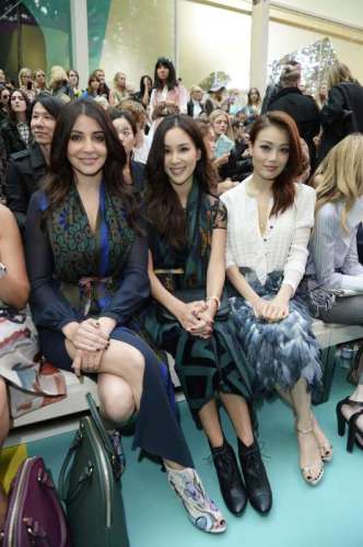 attends the front row at the Burberry Womenswear SS15 show during London Fashion week at Kensington Gardens on September 15, 2014 in London, England.