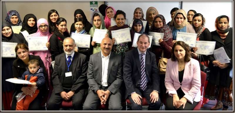 INTEGRATION CEREMONY: QED's Integration Yorkshire awards ceremony hosted at QED’s offices in Bradford with the then Parliamentary Under Secretary of State for Communities (Stephen Williams), sitting between Dr Mohammed Ali OBE (CEO of QED) and Adeeba (Deputy CEO).