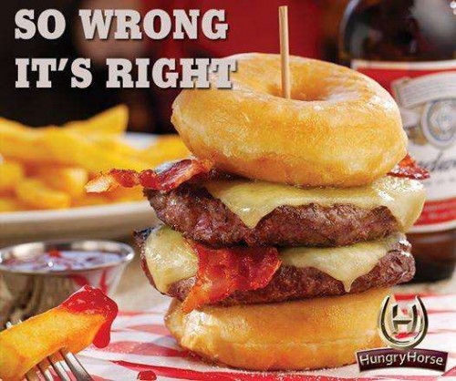 The controversial Double Donut Burger: Two beef burgers topped with melted cheese, 4 smoked streaky bacon rashers & BBQ sauce served in two grilled, glazed ring donuts - Total calory about 2000!