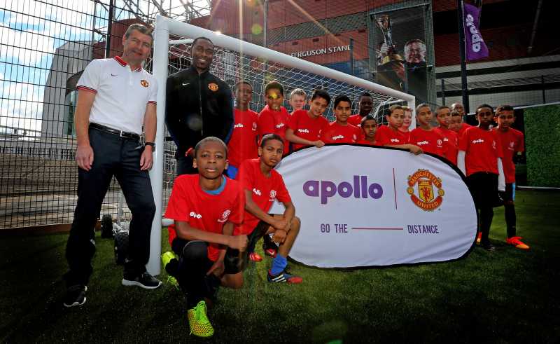 Pitch Perfect: Manchester United legends Denis Irwin and Andrew Cole at the launch of the new Apollo community pitch in the shadow of Old Trafford; the pitch is made from recycled tyre rubber