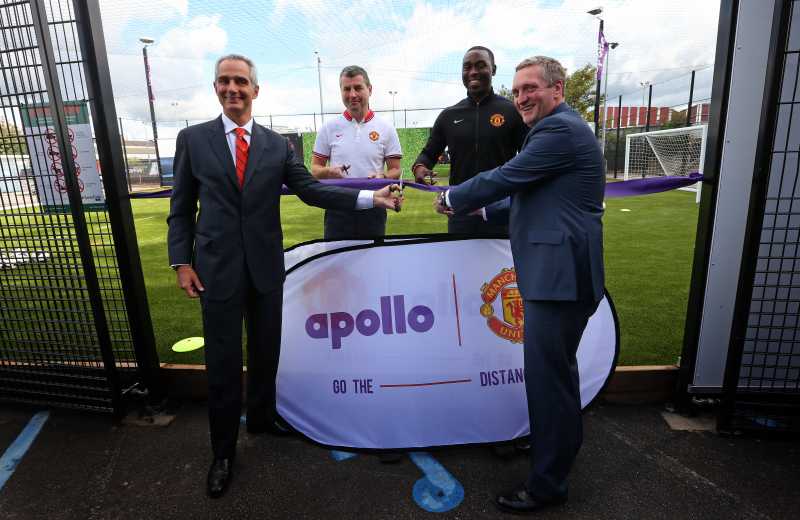 Andrew Cole, Marco Paracciani (Apollo), Jonathan Rigby (Manchester United) and Denis Irwin celebrating the recycled tyre rubber pitch release