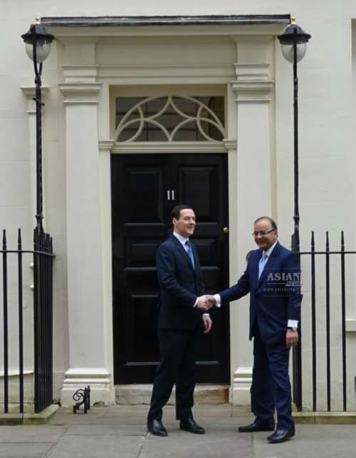 Indian Finance Minister Mr Arun Jaitley with Chancellor George Osborne at 11, Downing Street, London. Photo courtesy: PTI 