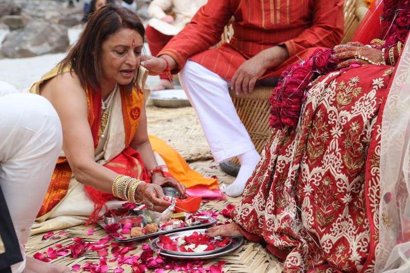Chanda Vyas performing a puja%20during%20her%20daughter's wedding