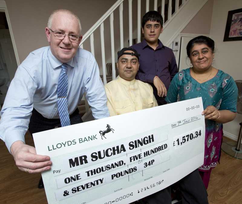 Constable Gary Carter with Sucha Singh and family