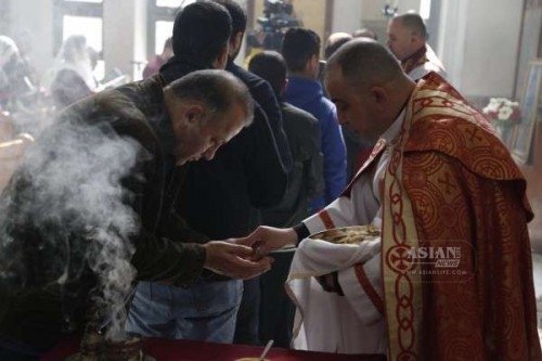 Christian Assyrians at a church mass in Syria