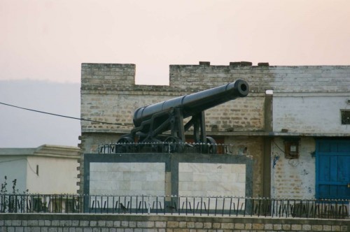 A nineteenth century cannon sits at the centre of a Pakistani village  