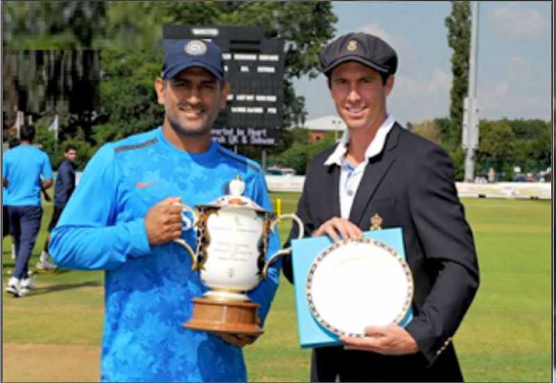 MS Dhoni & Wayne Madsen (captain of Derbyshire) with the Royal Crown Derby Trophy and Plate during tour match between Derbyshire and India