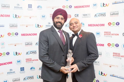 Gurjeev Singh Kapoor of Star TV accepts award from popular British actor Bhasker Patel