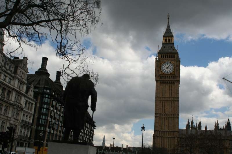 The statue of former prime minister Winston Churchill overlooks the Parliament House 