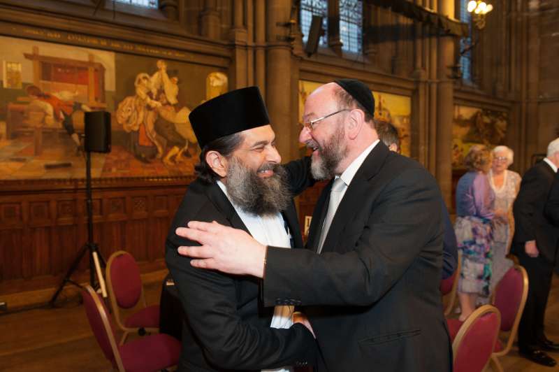 MJF Chief Rabbi and Ibrahim Mogra embracing