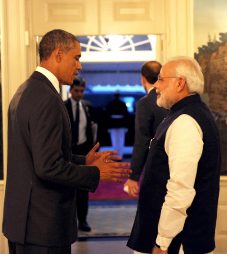 The President Barack Obama of the United States welcomes the Prime Minister, Shri Narendra Modi, at the dinner hosted in his honour, at the White House, in Washington FILE PHOTO