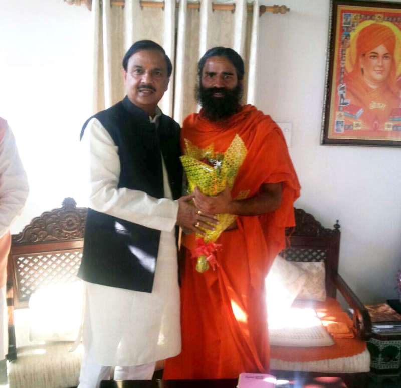 Minister of State for Culture & Tourism Dr. Mahesh Sharma meets the Yoga Guru, Baba Ramdev, in Haridwar