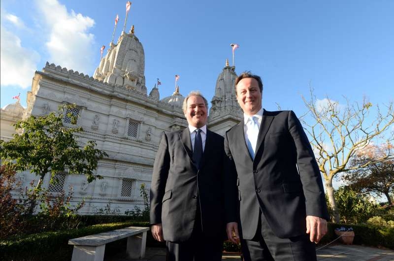 Bob Blackaman with Prime Minister David Cameron at Neasden temple