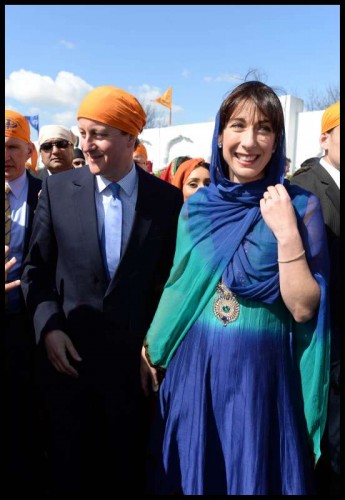 Prime Minister David Cameron and wife Samantha at the nagarkirtan in Kent. Picture by Andrew Parsons  i-Images