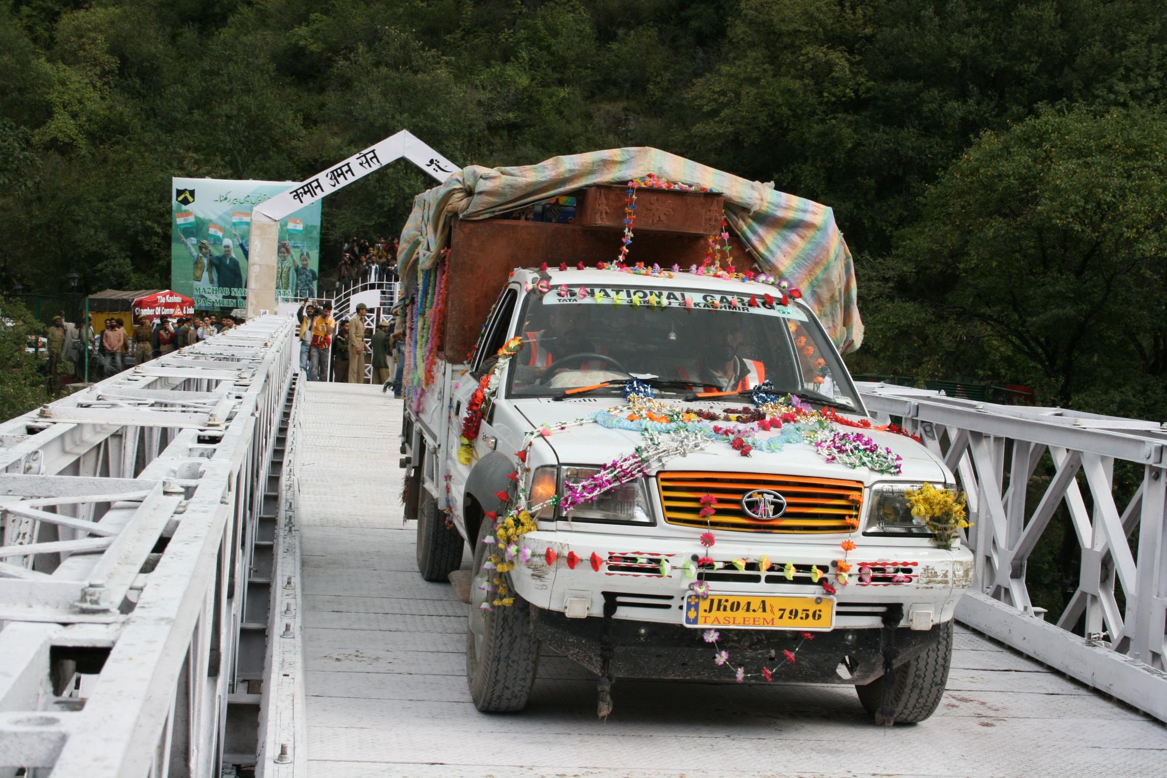 First truck carrying goods for trade crossing Aman Setu (peace bridge) at Chakoti in October 2008 at the Line of Control fromJammu and Kashmir (Indian side) to Azad Jammu and Kashmir (Pakistani side).