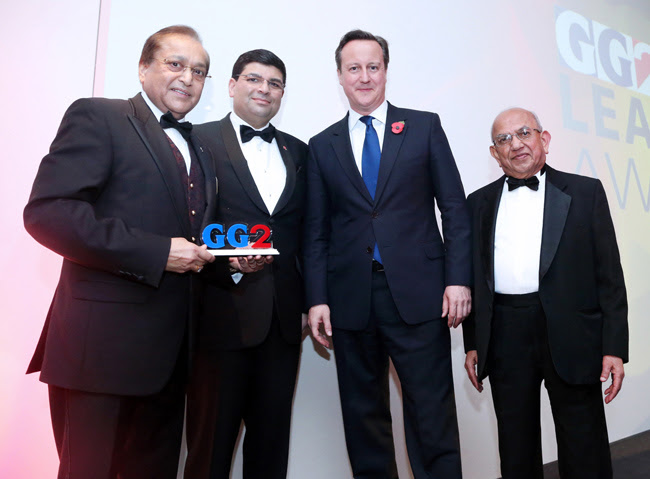 Dr Rami Ranger MBE receiving the “Man of the Year Award” from  Prime Minister David Cameron at the GG2 Leadership Awards 2014