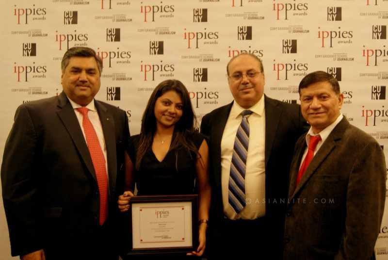 The South Asian Times team with the award -