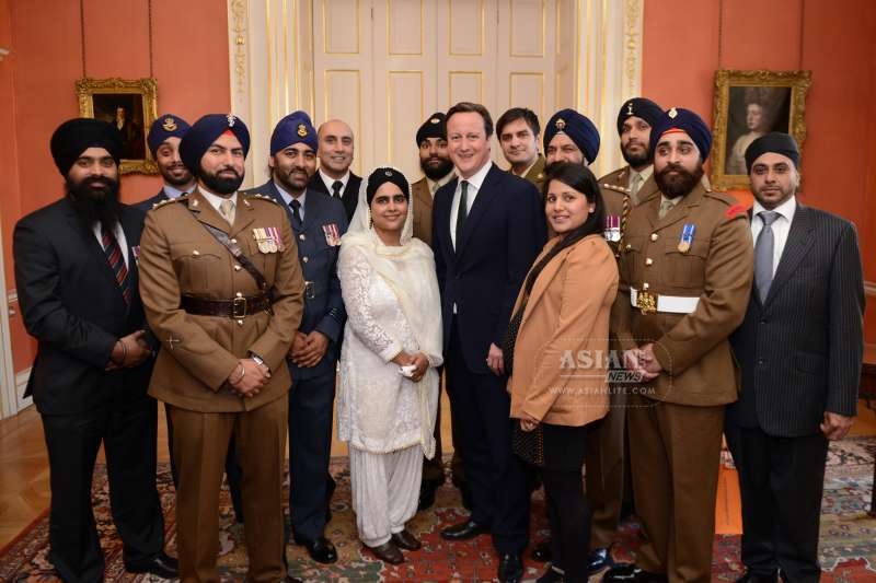Prime Minister David Cameron with soldiers from the army during a Vaisakhi reception at No 10 