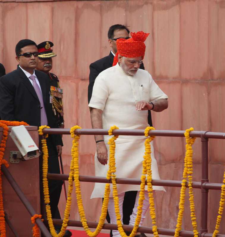 Prime Minister Narendra Modi arrives at Red Fort to hoist the national flag and address the nation on Independence Day in New Delhi on Aug 15, 2014. (Photo: IANS)