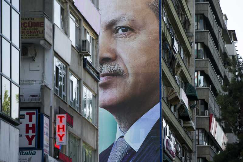 Turkey's Prime Minister and presidential candidate Tayyip Erdogan's giant poster is seen hung on the exterior wall of a residential building in Ankara, capital of Turkey