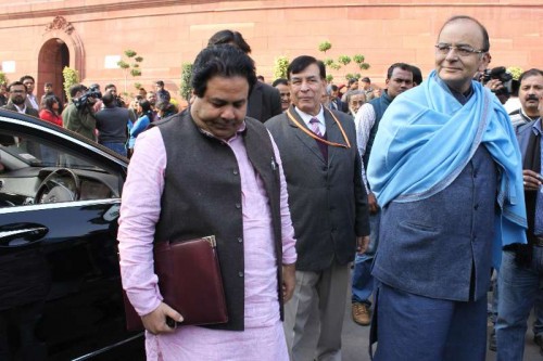 Union Minister for Finance, Corporate Affairs, and Information and Broadcasting Arun Jaitley and Congress MP Rajeev Shukla at the Parliament premises in New Delhi.