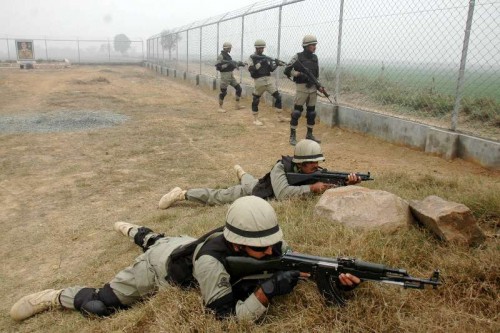  Pakistani rangers guard along the Pakistan-India border area of Wagah in eastern Pakistan's Lahore on Jan. 3, 2015. Pakistan army said that Indian forces shelled its border areas and killed a 13-year-old girl.