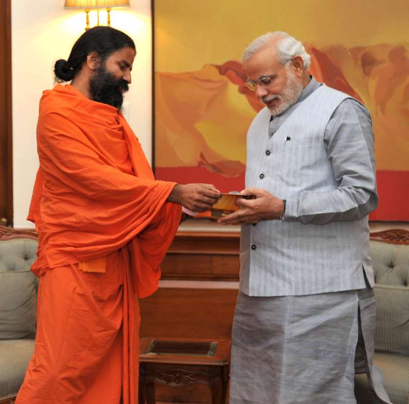 Yoga Guru Ramdev calls on Prime Minister Narendra Modi, in New Delhi.