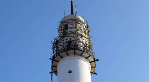 Workers are seen painting the Bhimsen tower as part of the preparations for upcoming South Asian Association for Regional Cooperation (SAARC) Summit in Kathmandu, Nepal, on November 10, 2014.The SAARC Summit will be held from Nov. 22 to 27 in Kathmandu.