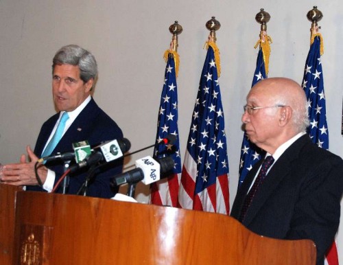  U.S. Secretary of State John Kerry  attends a joint press conference with Pakistani Adviser to the Prime Minister on National Security and Foreign Affairs Sartaj Aziz in Islamabad, capital of Pakistan. The U.S. Secretary of State, John Kerry, Tuesday called for action against all militant groups including the Afghan Taliban, the Haqqani Network and the Lashkar- e-Tayyeba. 