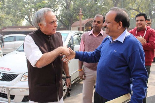  Union Minister for Science and Technology and Earth Sciences Dr Harsh Vardhan greets Congress MP Jairam Ramesh at the Parliament House on the first day of Parliament's winter session in New Delhi, on Nov 24, 2014. 