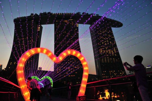 Visitors view lanterns for the upcoming Mid-Autumn Festival in Singapore. A light-up ceremony is held here before the festival. 