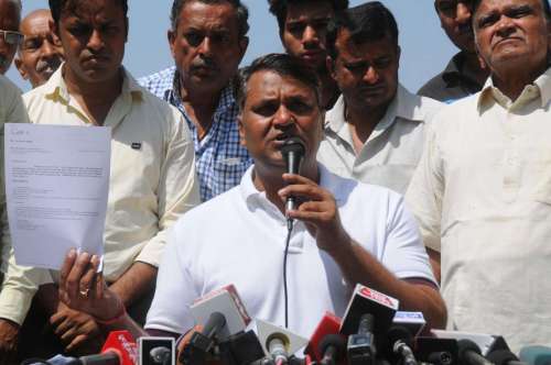 Delhi legislator Vinod Kumar Binny addresses a press conference at his residence in New Delhi