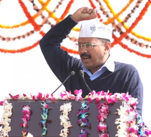 Delhi Chief Minister Arvind Kejriwal addresses public after taking oath at Ramlila Maidan in New Delhi, on Feb 14, 2015. 