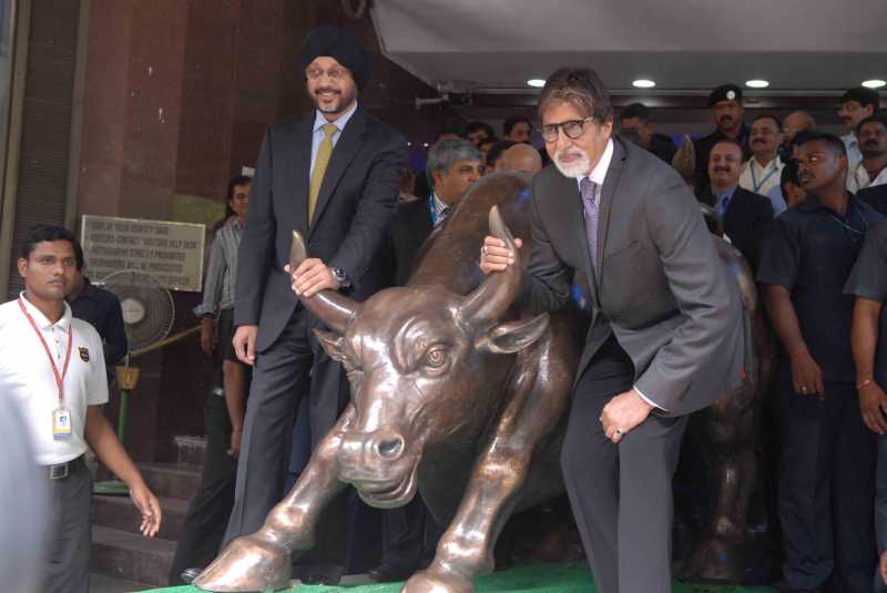 Actor Amitabh Bachchan rings the bell during an event organized to promote the upcoming television serial 'Yudh' at the Mumbai Stock Exchange (BSE)