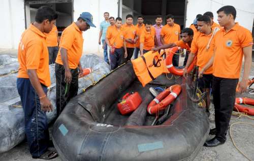 Odisha Disaster Rapid action force (ODRAF) personnel test their raft in light of Indian Meteorological Department's cyclone alert for the north coastal Andhra Pradesh 