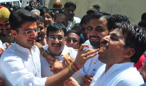 Rajasthan Congress chief Sachin Pilot celebrates party's victory in the recently concluded bypolls in Jaipur.