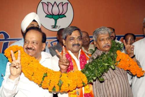 Union Health Minister and former Delhi BJP chief Harsh Vardhan hands over the charge to newly appointed Delhi BJP chief Satish Upadhyay during a programme at BJP office in New Delhi