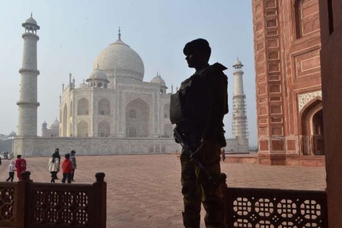 A soldier stands guard at the Taj Mahal ahead of US President Barack Obama's expected visit on 27th January 2015, in Agra, on Jan 20, 2015