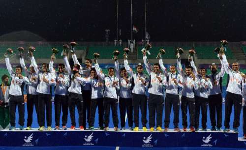 Gold medalists players of India pose on the podium during the awarding ceremony of the men's hockey contest at the 17th Asian Games in Incheon, South Korea, 