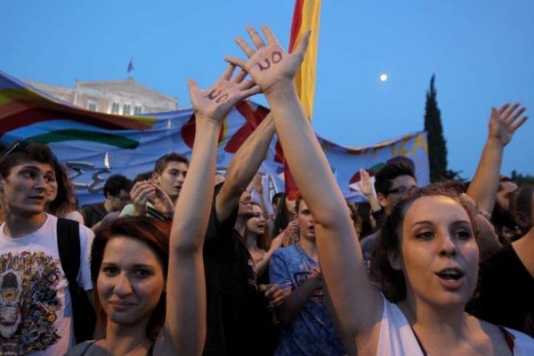 Thousands of Greeks participate in a rally called by governing Syriza party to protest against austerity measures and urge voters to say "No" in the July 5 referendum on bailout terms in Athens, Greece, on June 29, 2015. Breakdown in negotiations between Athens and its international creditors plunged the country deep into crisis. Greek government announced capital controls until July 6, while banks and Athens Stock Exchange remain shut. 