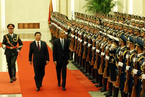  Chinese President Xi Jinping  holds a welcoming ceremony for U.S. President Barack Obama (3rd L) at the Great Hall of the People in Beijing, capital of China, Nov. 12, 2014.