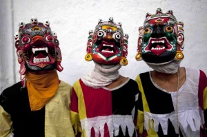 Newaris in traditional costume wear masks of Lakhey ahead of Janmashtami festival at Basantapur in Kathmandu, Nepal.