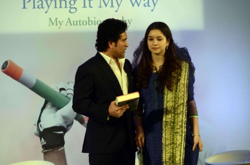 Cricket legend Sachin Tendulkar with his daughter Sara at the launch his autobiography `Playing It My Way` in Mumbai, on Nov 5, 2014.