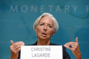 (140616) -- WASHINGTON D.C., June 16, 2014 (Xinhua) -- International Monetary Fund(IMF) Managing Director Christine Lagarde(R) speaks during a press conference at the IMF headquarters in Washington D.C., the United States, on June 16, 2014. The International Monetary Fund on Monday sharply lowered its U.S. economic growth forecasts for this year from the perviously predicted 2.8 percent to 2 percent due to a weak first quarter. (Xinhua/Yin Bogu)