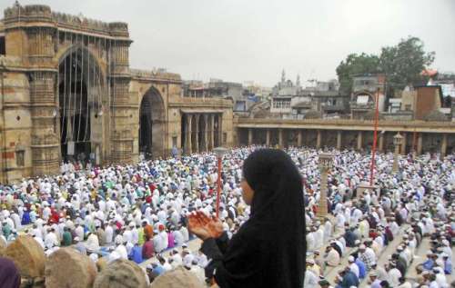 Muslims offer prayers on the occasion of Eid ul-Fitr at a mosque in Ahmedabad on July 29, 2014. (Photo: IANS)