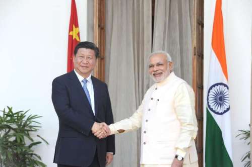 Prime Minister Narendra Modi shaking hands with the Chinese President Xi Jinping at Hyderabad House in New Delhi 