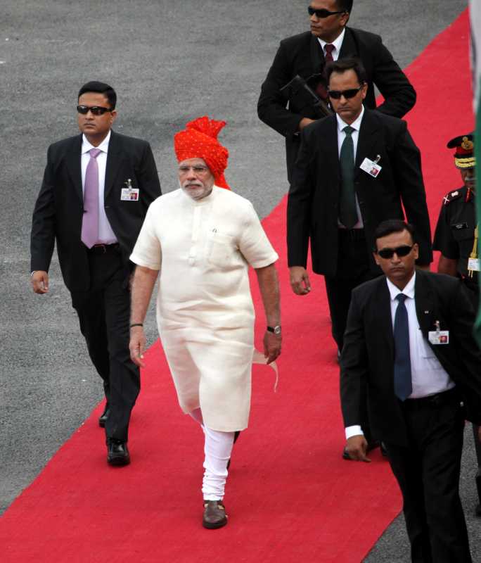 Prime Minister Narendra Modi arrives at Red Fort to hoist the national flag and address the nation on Independence Day in New Delhi on Aug 15, 2014. (Photo: IANS)