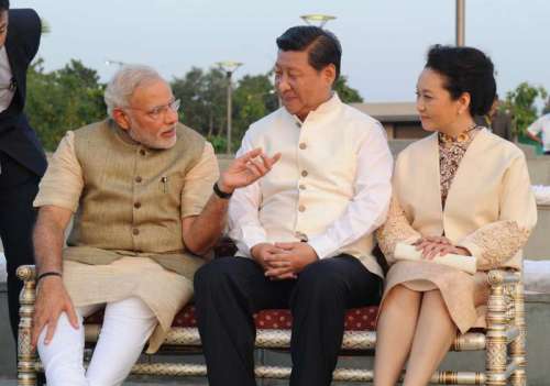 Prime Minister Narendra Modi with the Chinese President Xi Jinping and the First Lady of the Republic of China, Peng Liyuan, at Sabarmati Waterfront, in Ahmedabad, Gujarat on September 17, 2014. (Photo: IANS/PIB)