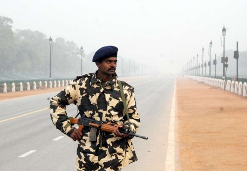 A soldier stands guard on Rajpath as security has been beefed-up in the area ahead of Republic Day in New Delhi. 