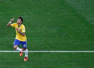 Neymar celebrates his first goal against Croatia.